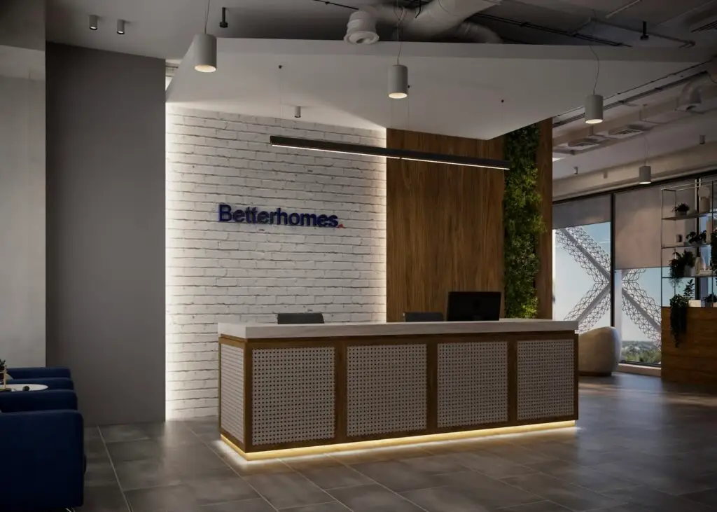 Better Homes reception in Doha with a white brick wall, walnut panelling and a perforated reception desk lit from below