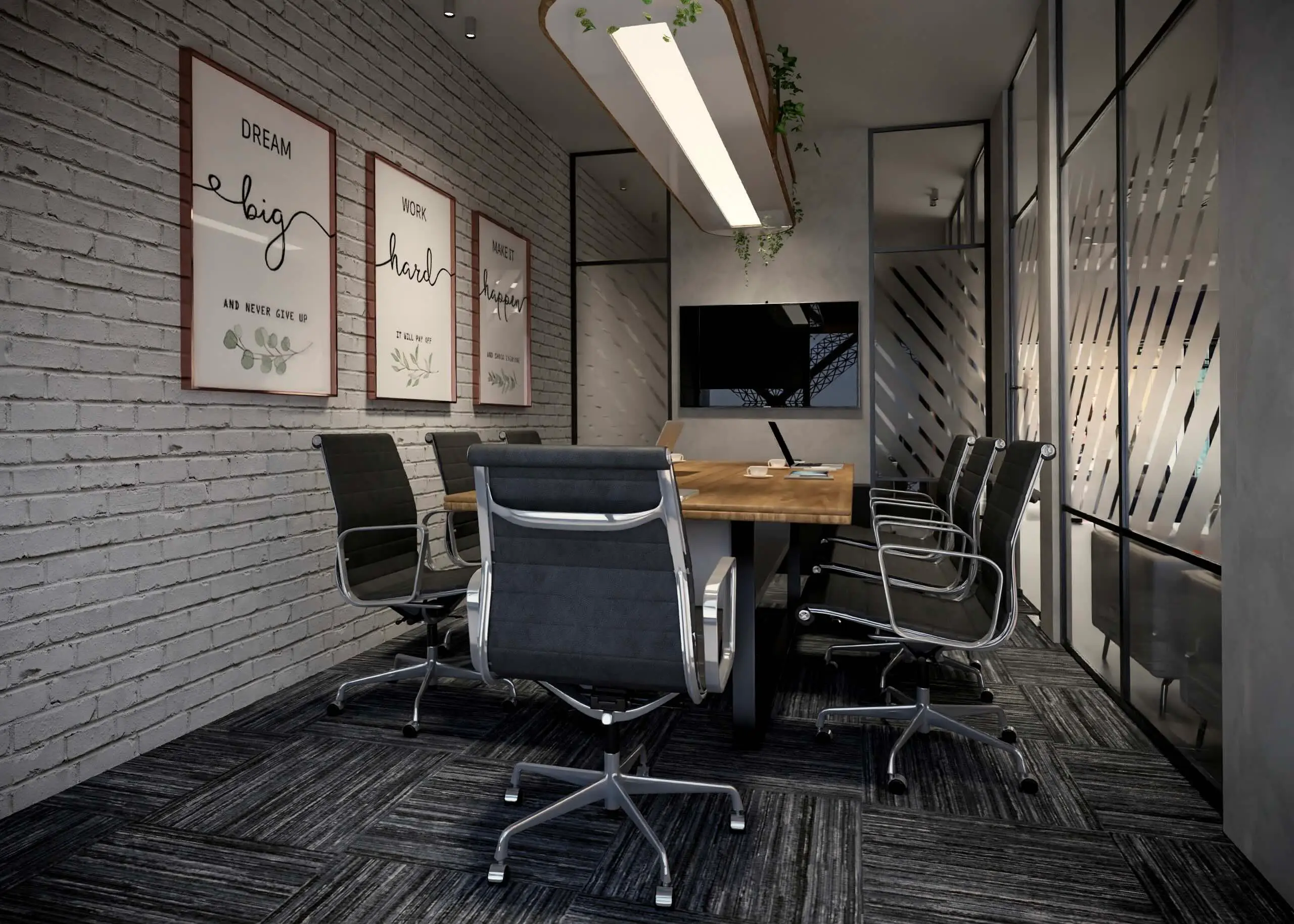 Boardroom with a timber table, black chairs, framed prints on a white brick wall and a linear pendant light