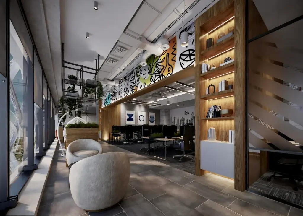 Open workspace seen past lit timber shelving, with mural graphics and lounge chairs along the windows