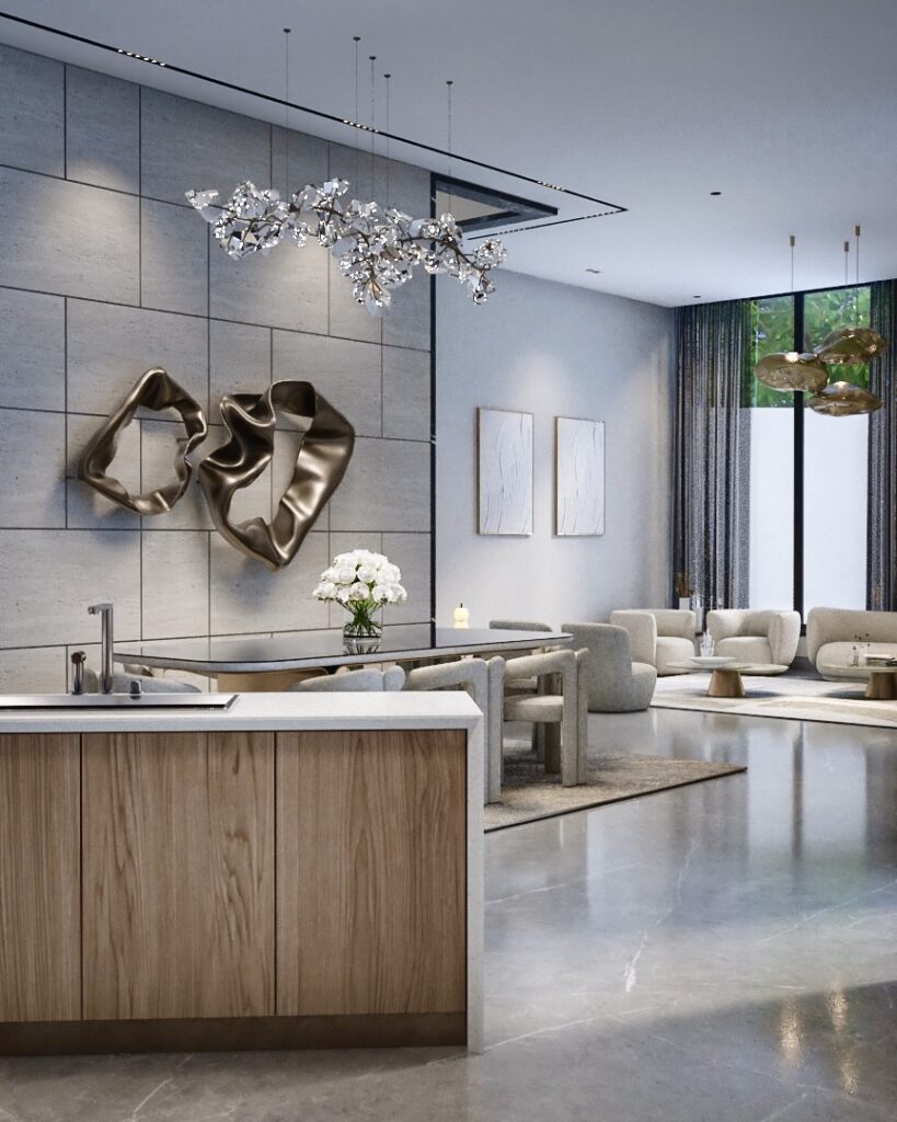 Oak kitchen island with bronze wall sculptures and a crystal chandelier over the dining table