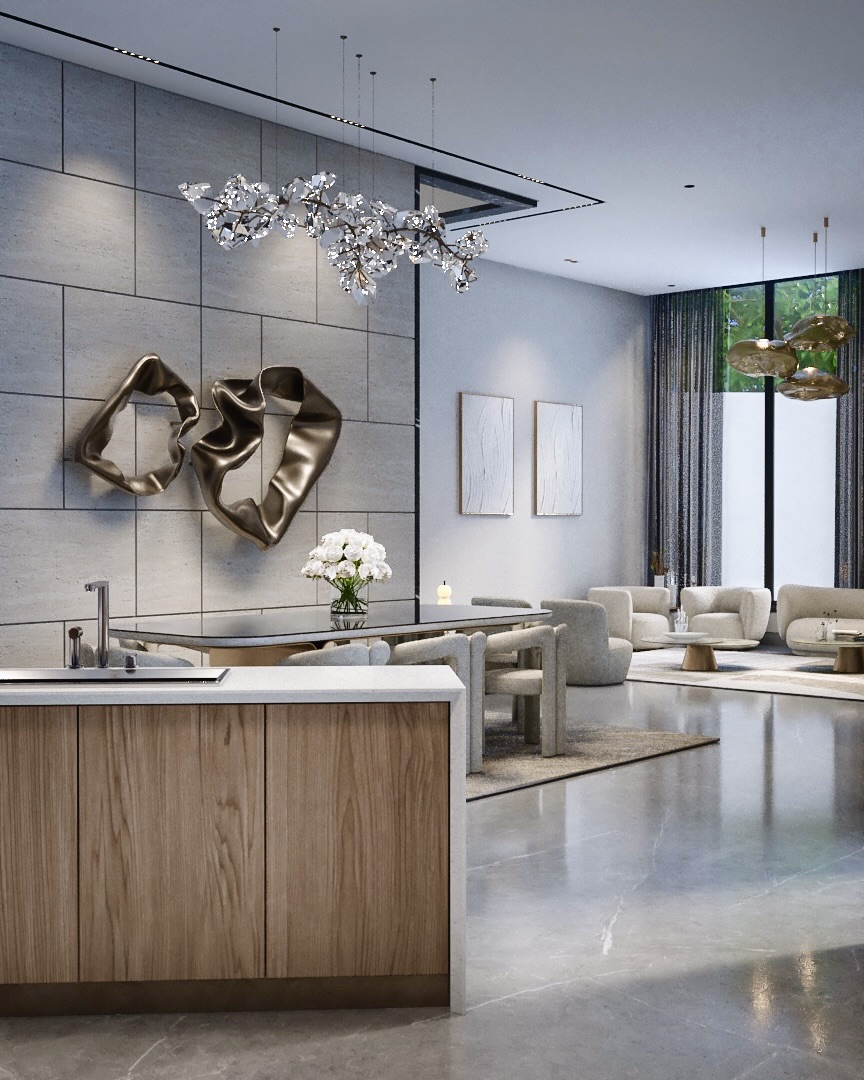Oak kitchen island with bronze wall sculptures and a crystal chandelier over the dining table